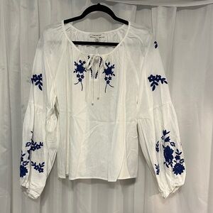 Francesca's Collections White Blouse with Blue Embroidery